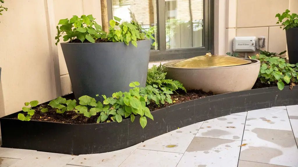 Go Metal: The Advantages and Disadvantages of Fiberglass Planters - Plantercraft
